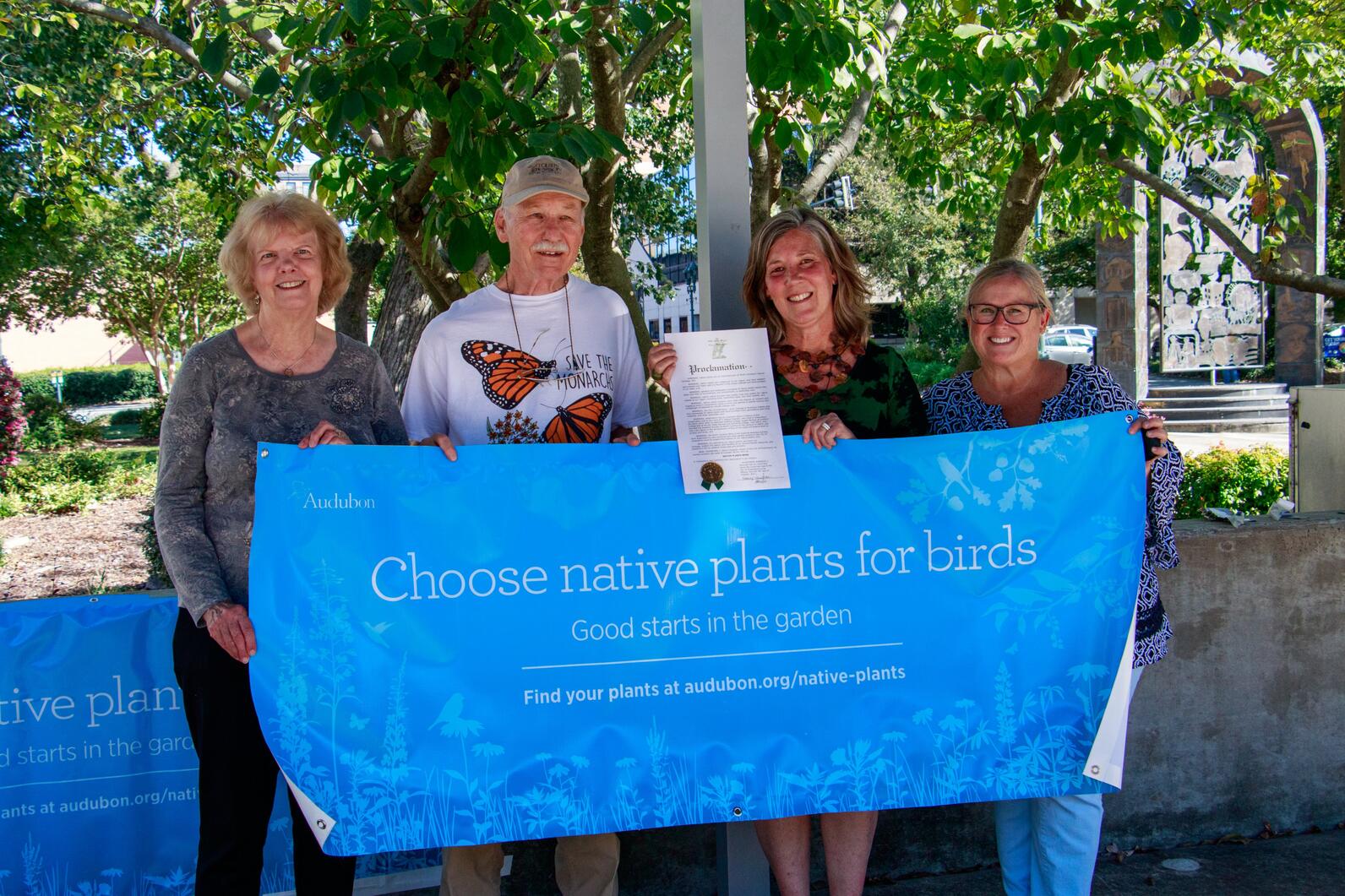 T. Gilbert Pearson Audubon leaders celebrate Greensboro's Native Plants Week proclamation.