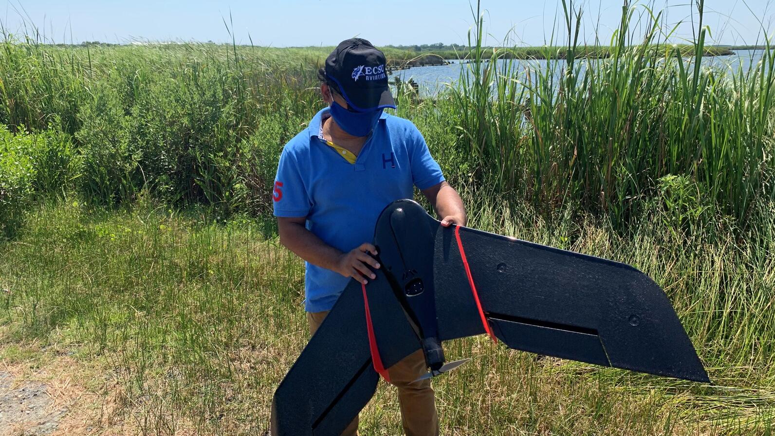 Dr. Kuldeep Rawat of Elizabeth City State University with a fixed-wing drone.