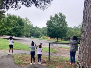 Local students on a bird walk led by the chapter